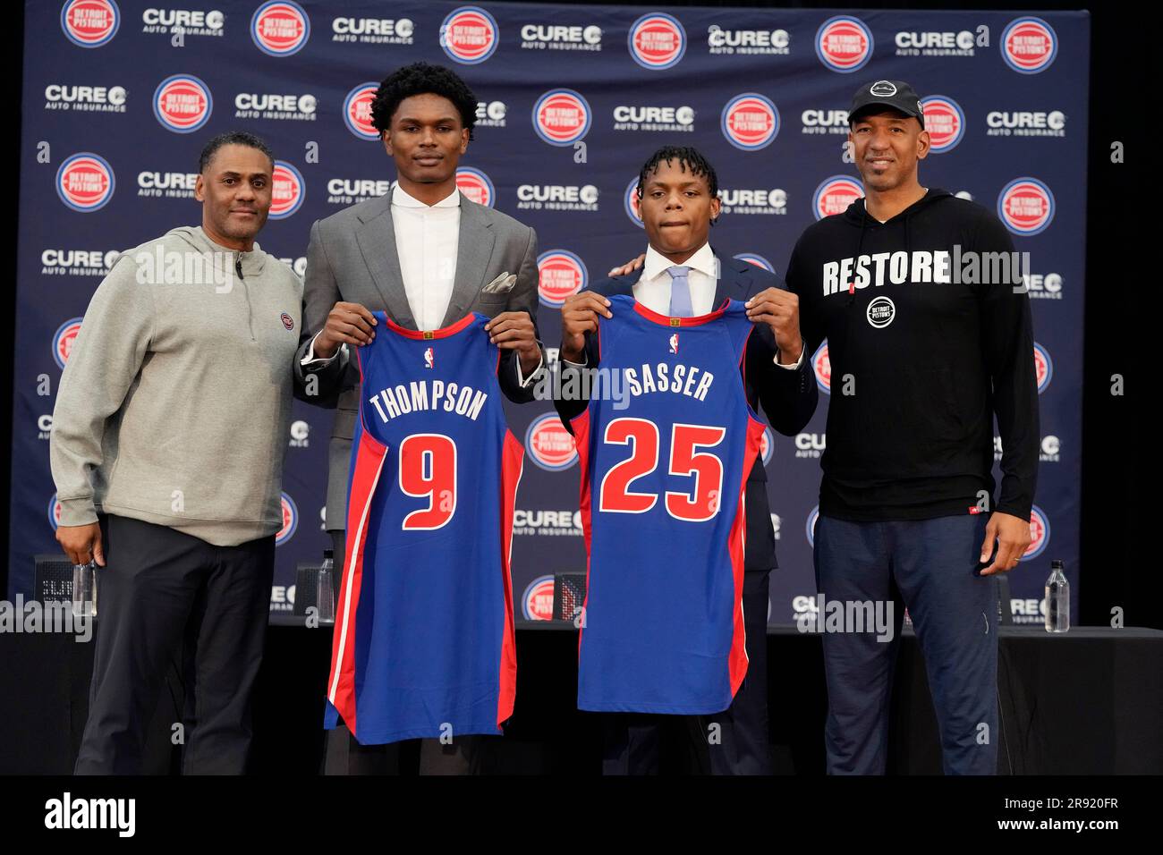 From left to right, Detroit Pistons general manager Troy Weaver, No. 5