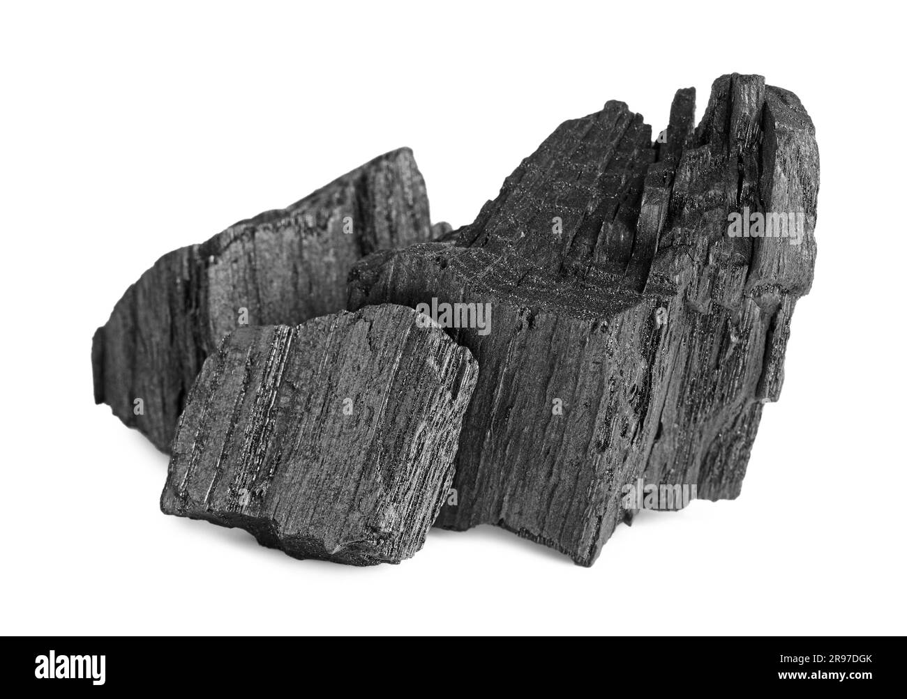 Morceaux de charbon isolés sur blanc. Dépôts minéraux Banque D'Images