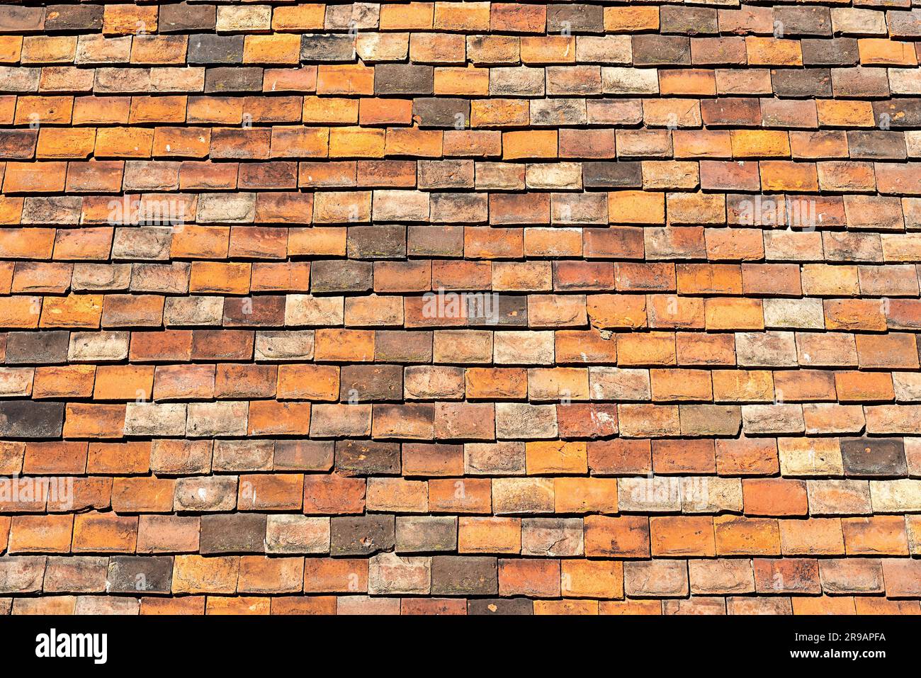 Arrière-plan d'un vieux mur de briques orange Banque D'Images