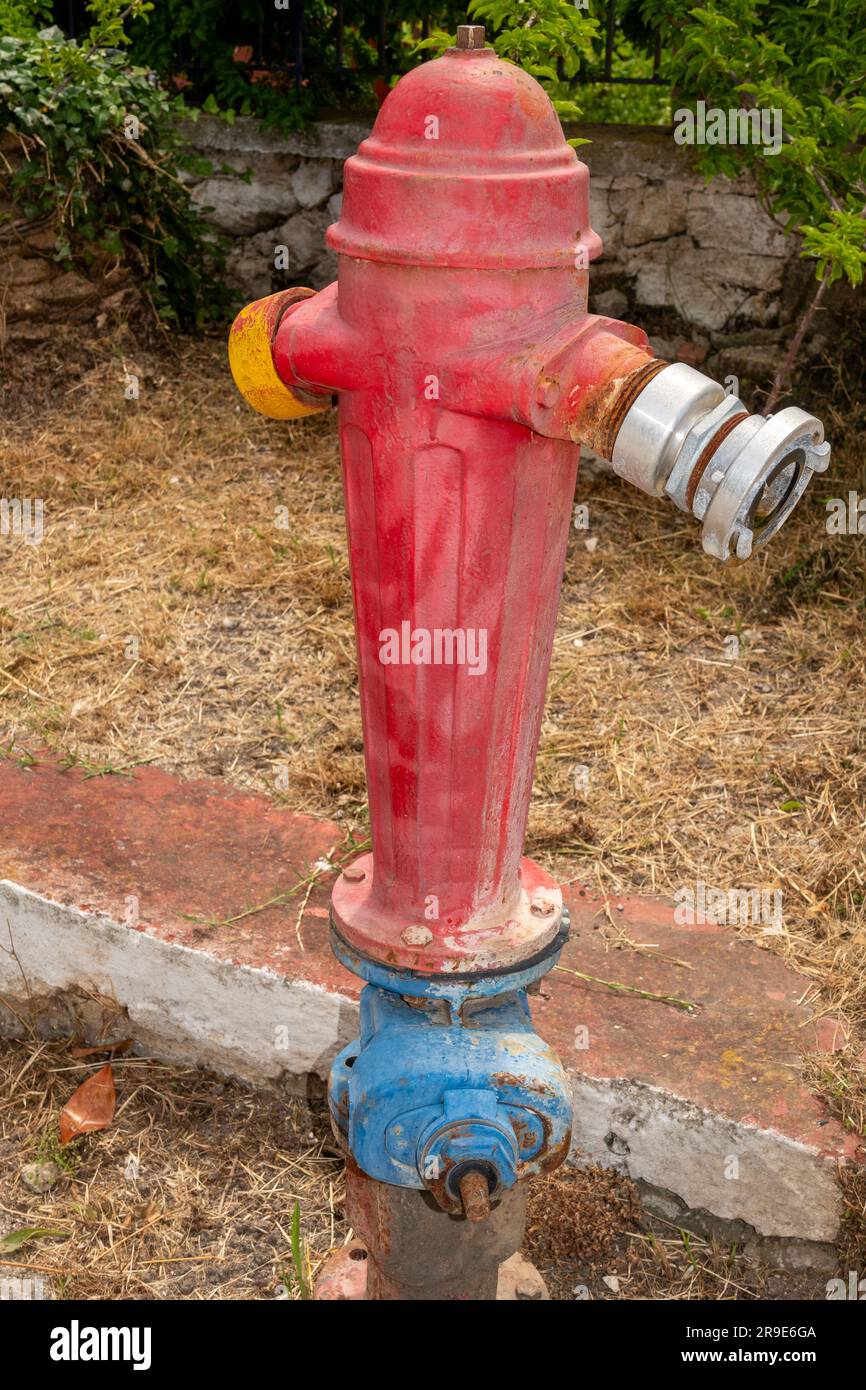 Borne rouge de feu peinte, Kefalonia, Grèce Banque D'Images