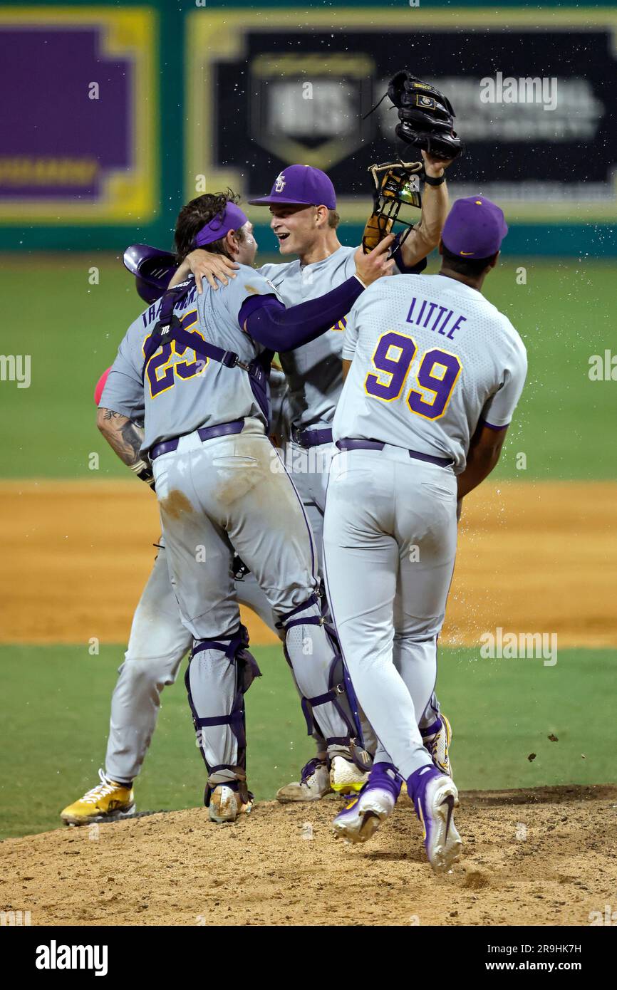 LSU infielder Gavin Guidry celebrates with catcher Hayden Travinski (25) after defeating