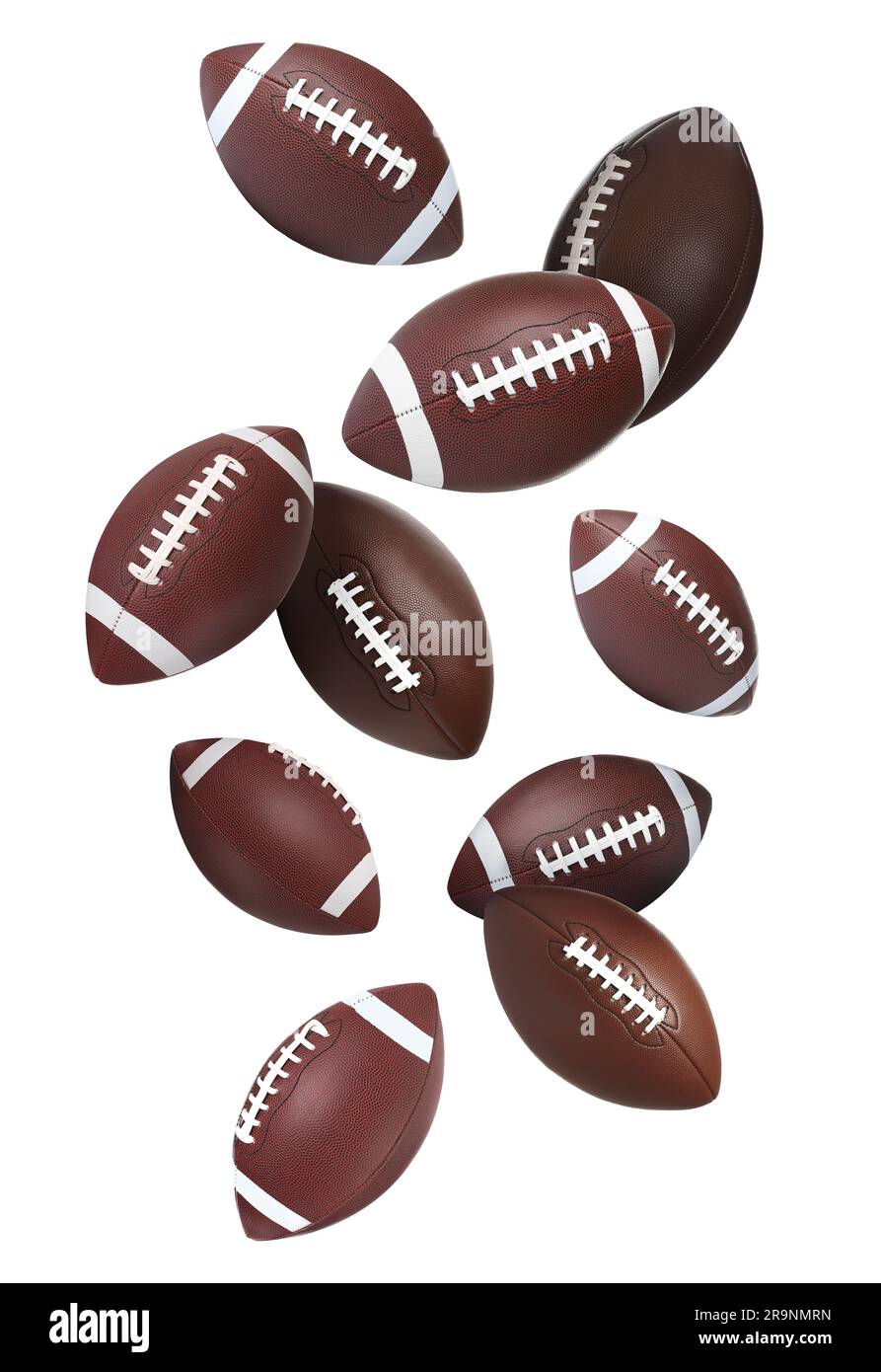 Balles de football américain en cuir tombant sur fond blanc Banque D'Images