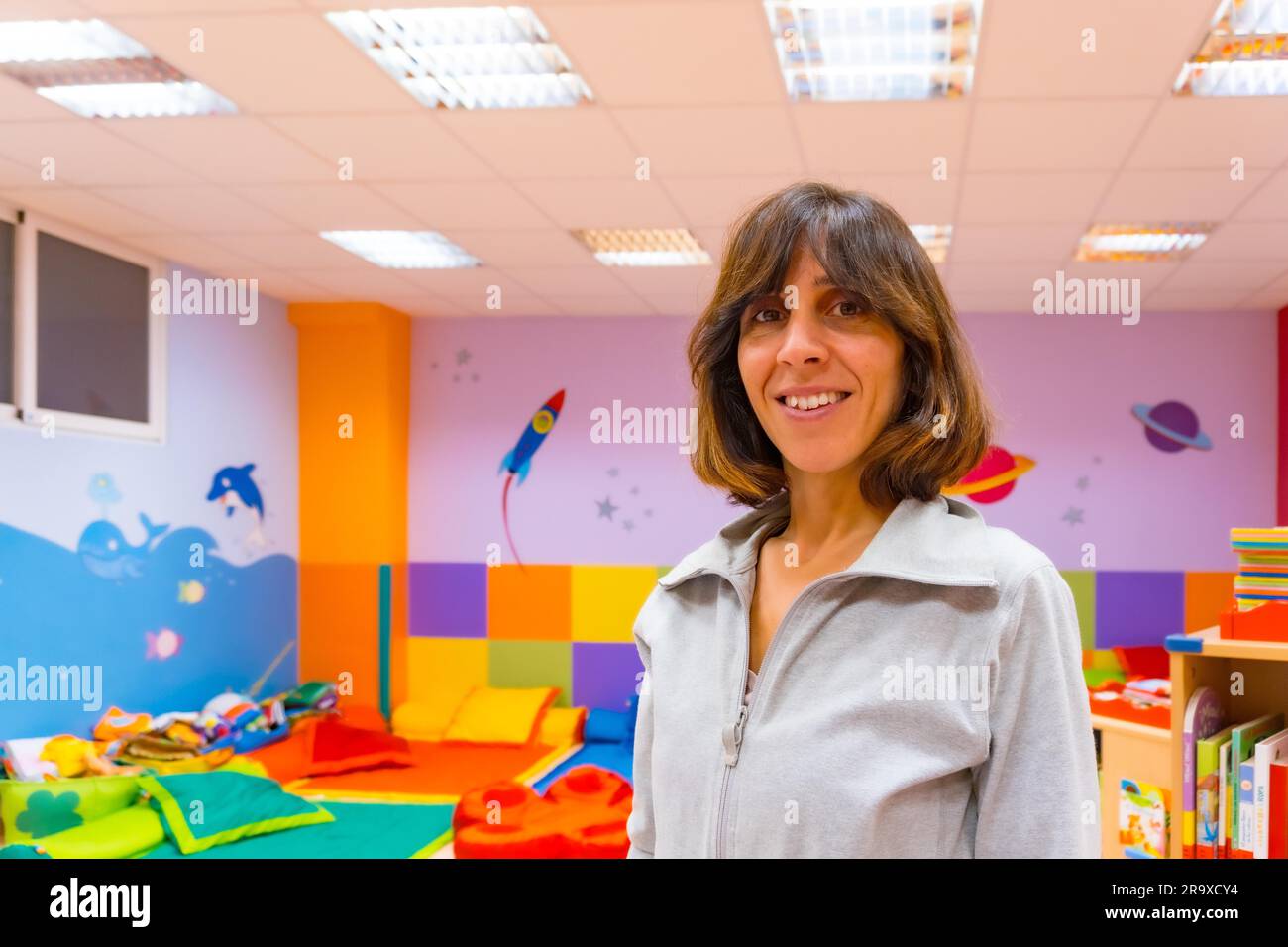 Enseignante en maternelle Banque de photographies et d’images à haute