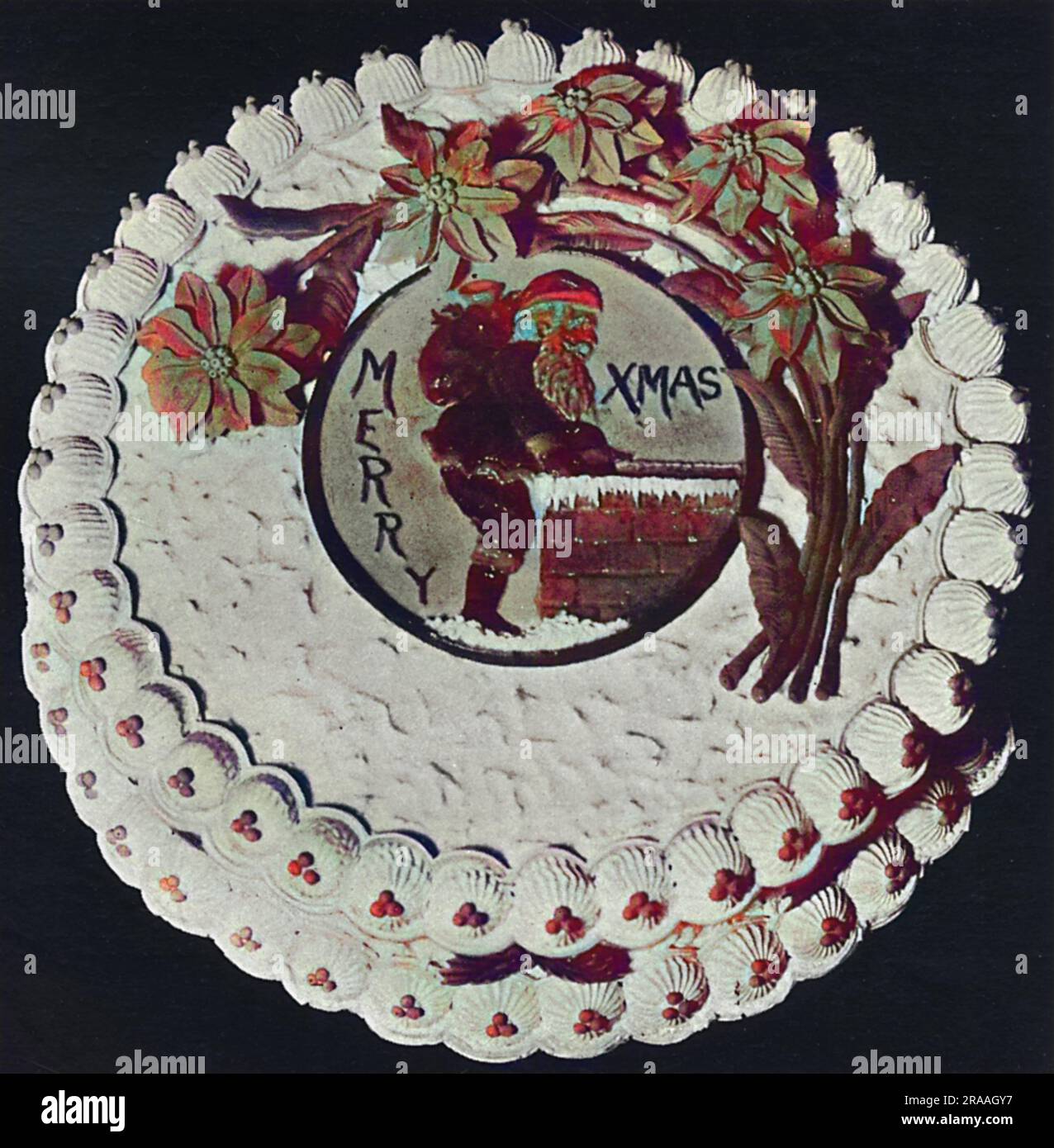 Gâteaux de saison, gâteau de Noël. Plaque du Père Noël en massepain et vaporisateur de Poinsettias Date: 1936 Banque D'Images