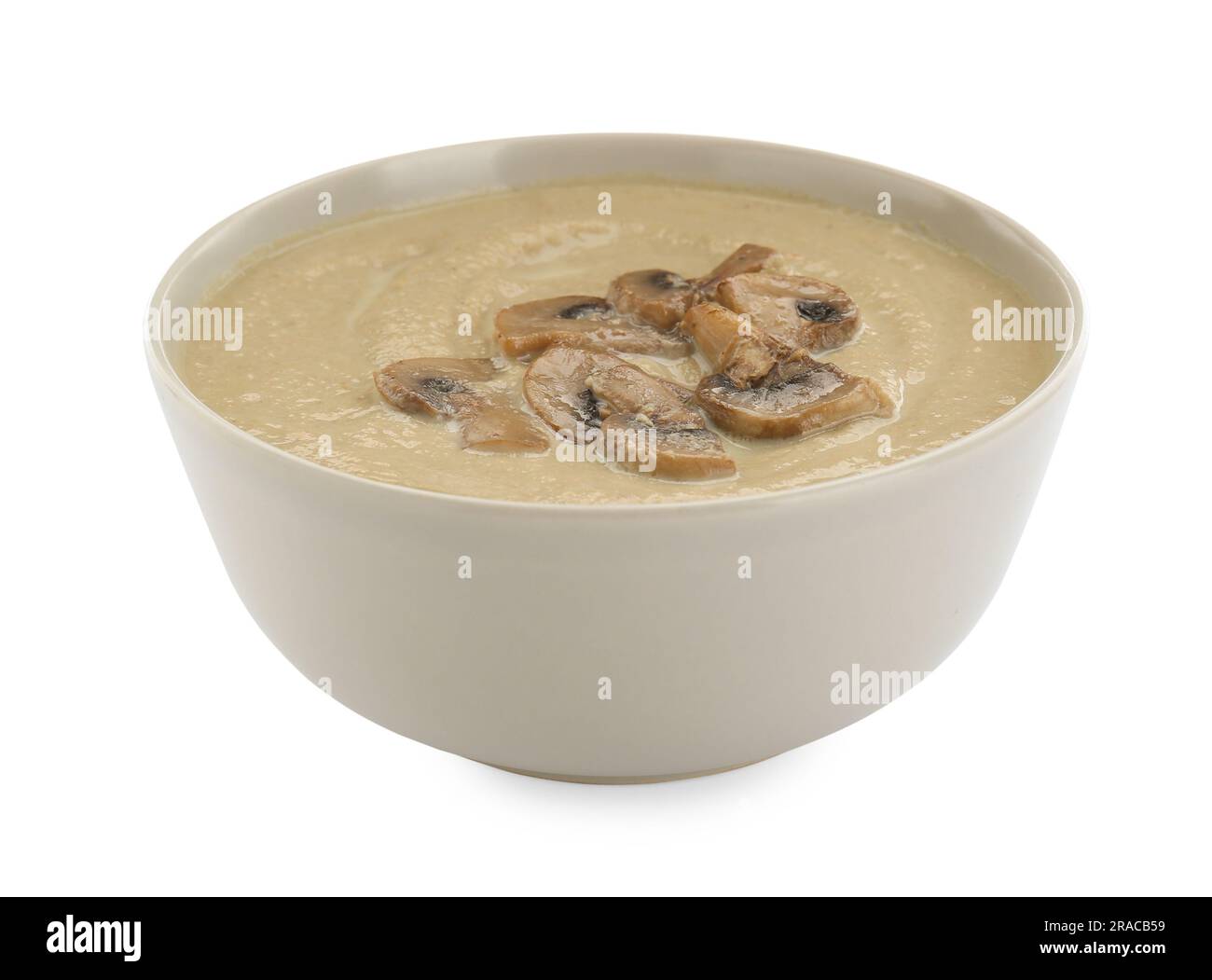Délicieuse soupe à la crème de champignons isolée sur blanc Banque D'Images