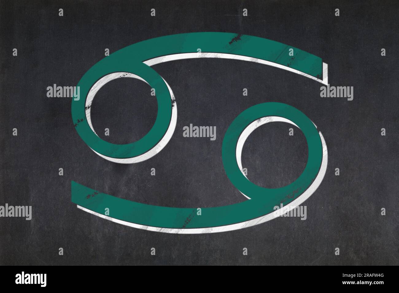 Tableau noir avec le signe du zodiaque 'cancer' dessiné au milieu. Banque D'Images