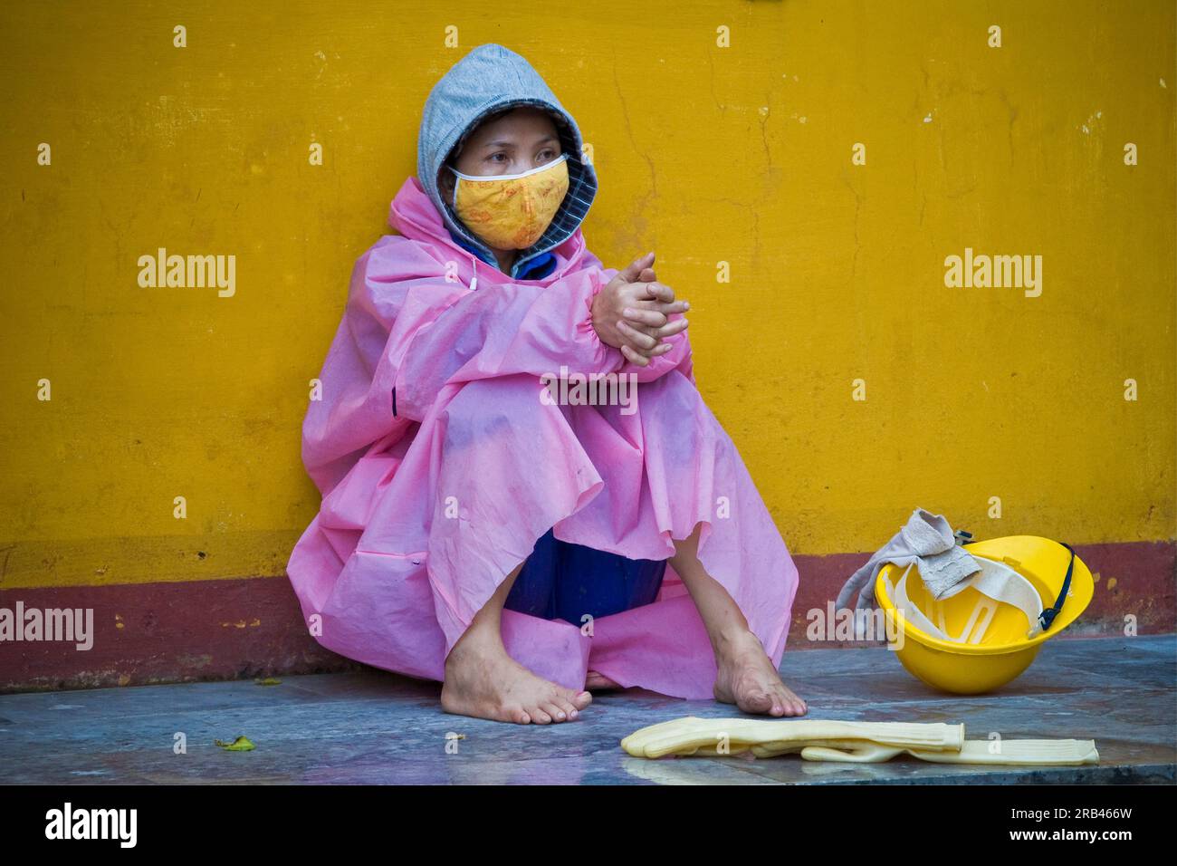 Femme avec casque, Hoi An, Vietnam Banque D'Images