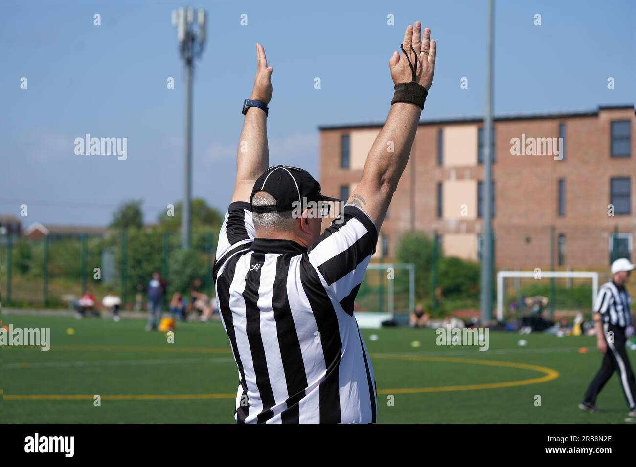 Vue inversée de la signalisation officielle du football américain touchdown Banque D'Images