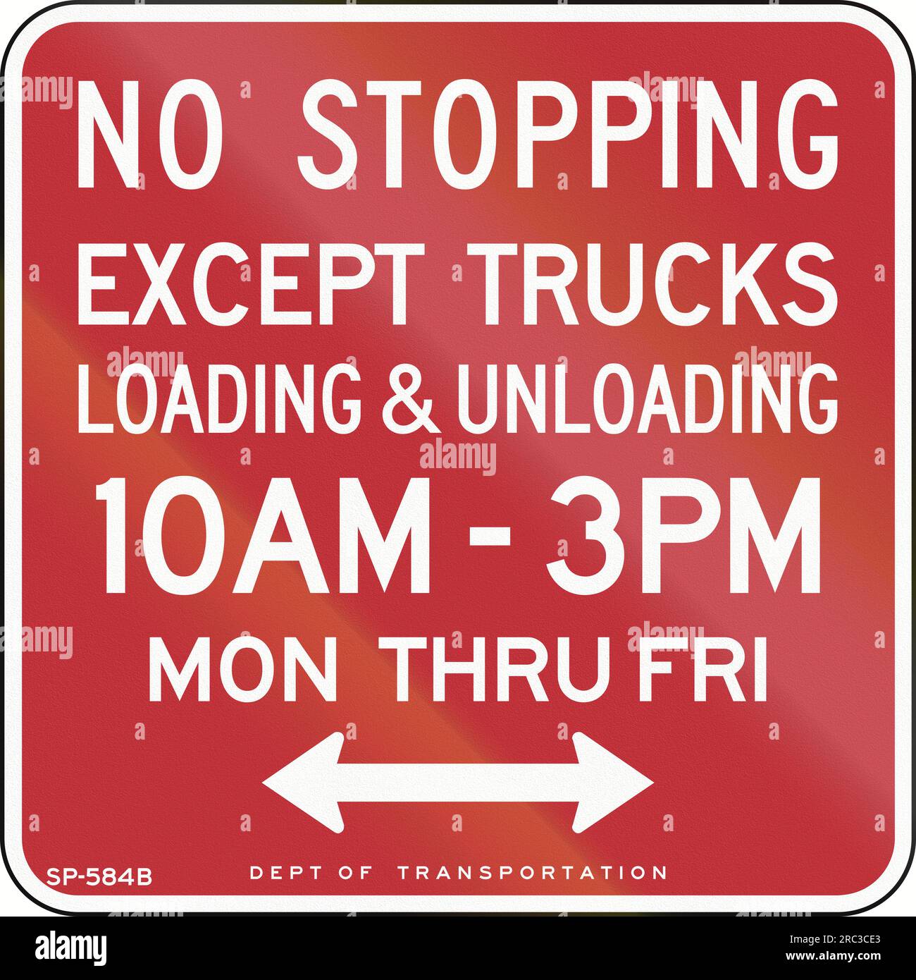 Panneau de signalisation US : pas d'arrêt dans le temps spécifié sauf chargement et déchargement des camions Banque D'Images