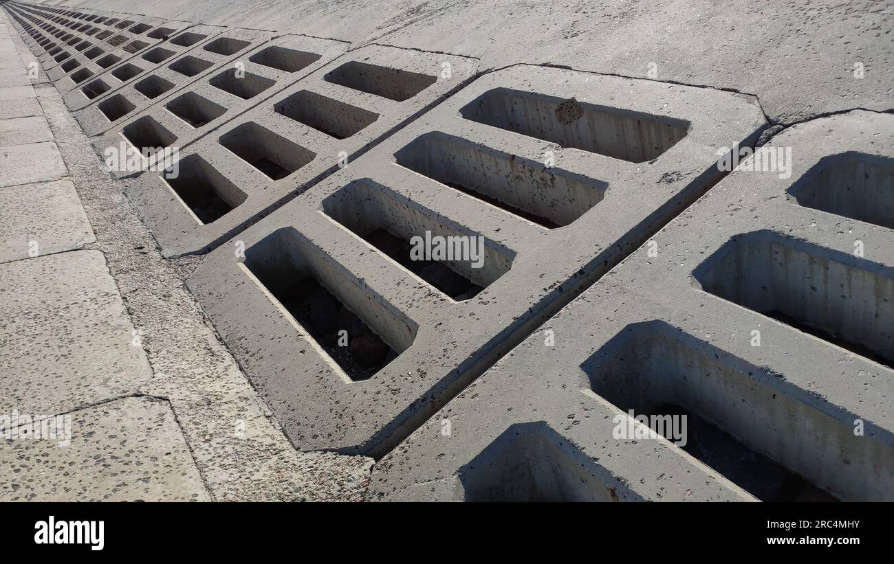 Fond avec des grilles de béton technologiques Banque D'Images