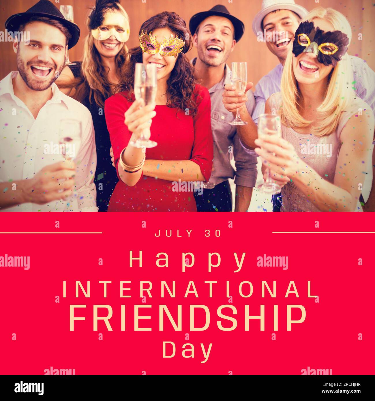 Heureux texte de la journée internationale de l'amitié avec des amis caucasiens heureux dans des masques et des chapeaux à la fête Banque D'Images