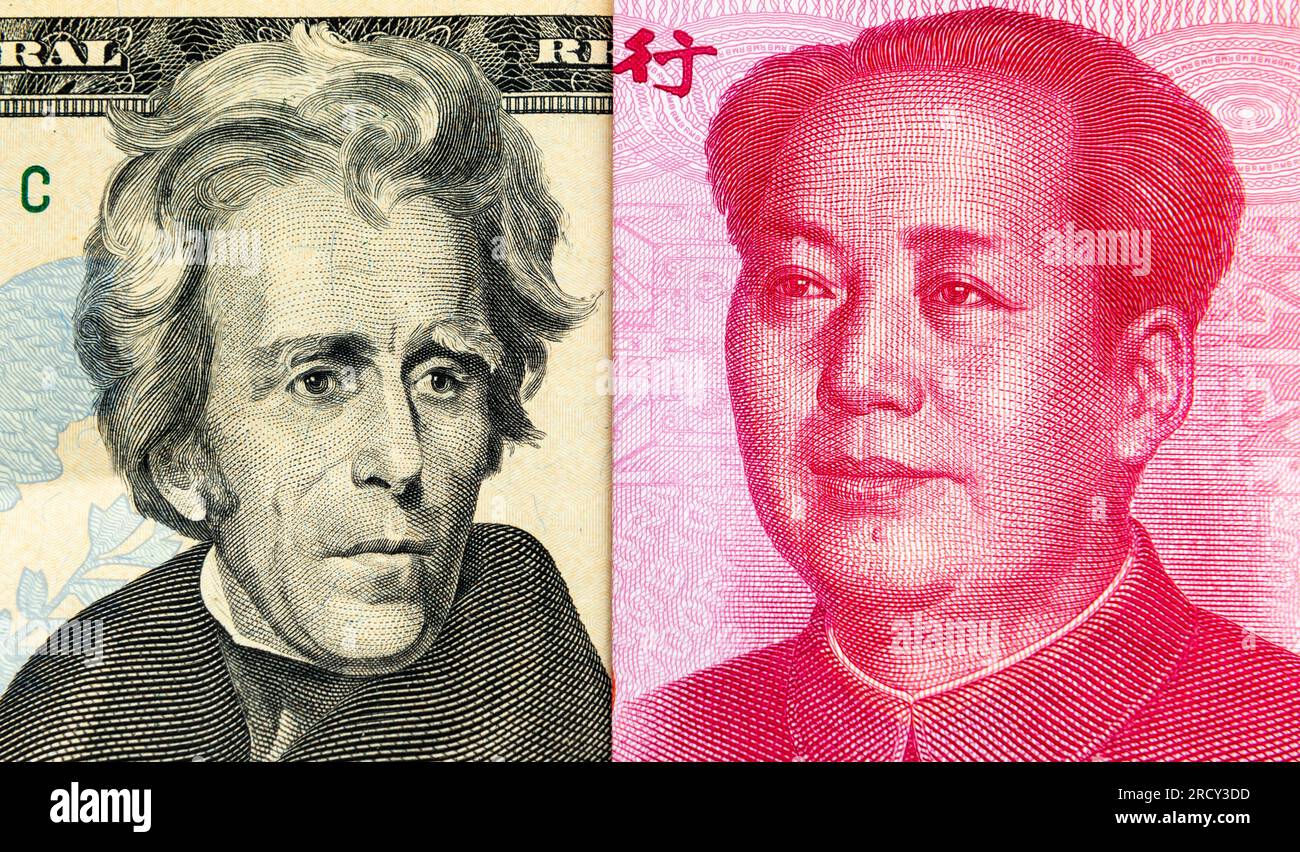 Gros plan d'un billet de 20 USD et d'un billet de banque chinois de 100 yuans. Un concept de conflit de concurrence financière monétaire. Banque D'Images
