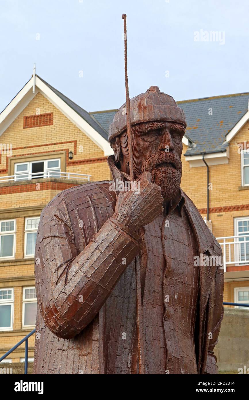 Sculpture en acier pour Filey - A High Tide in Short Wellies, par l'artiste Ray Lonsdale, The Beach Rd, Filey, North Yorkshire, Angleterre, ROYAUME-UNI, YO14 9LW Banque D'Images