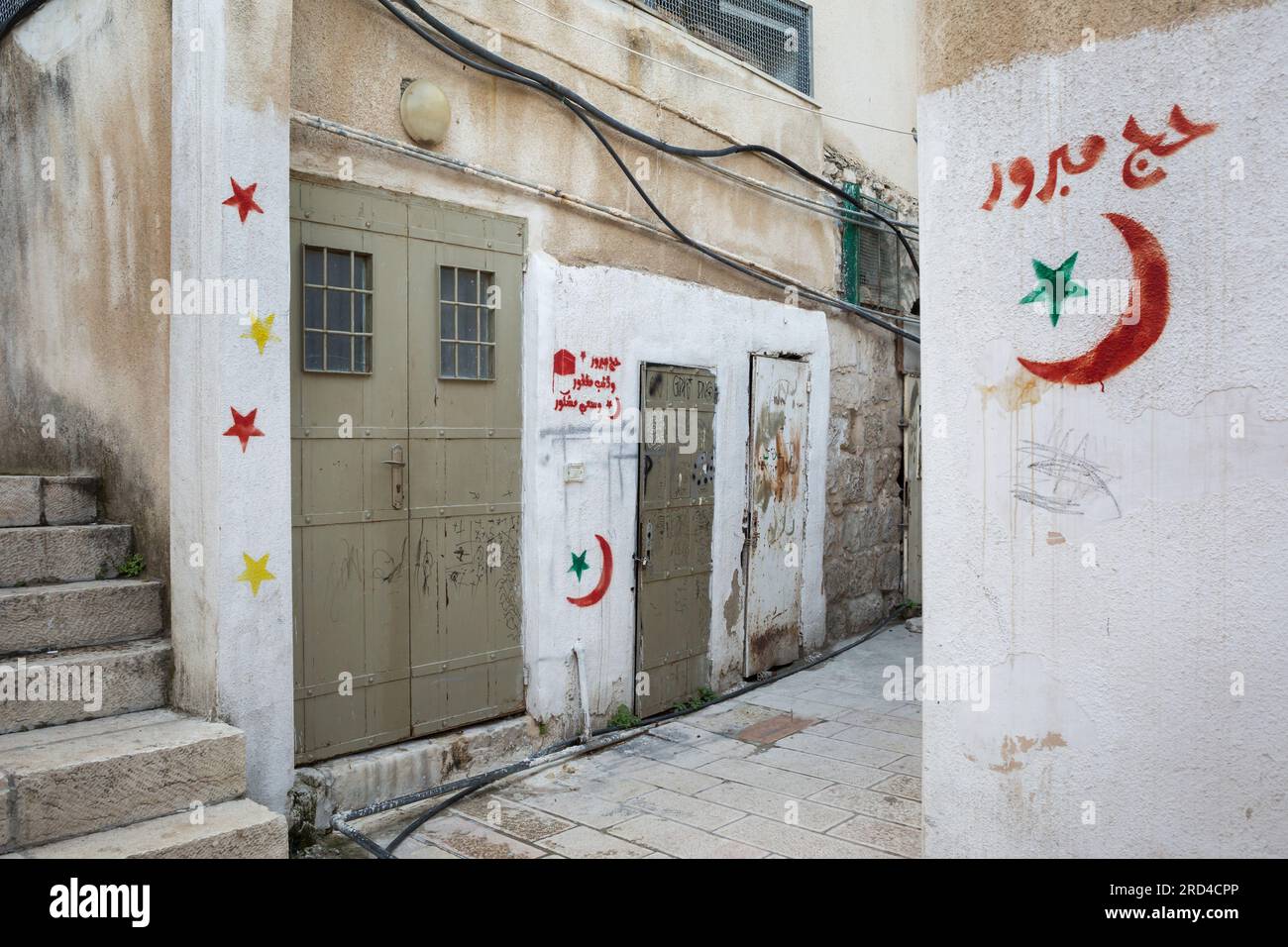 Graffiti arabe sur les rues du quartier musulman de la vieille ville de Jérusalem Banque D'Images
