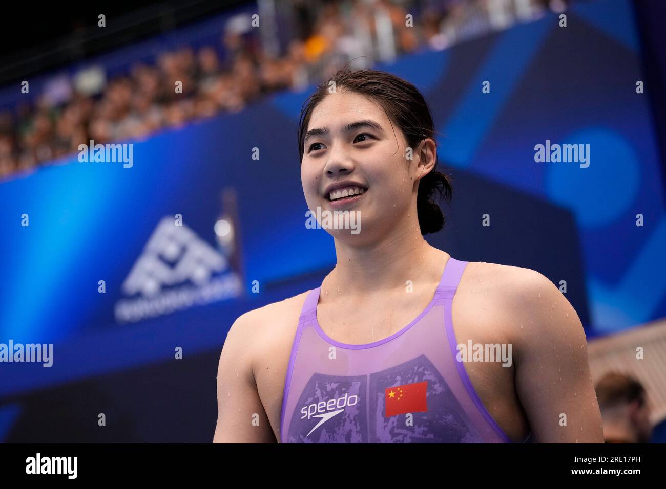 Zhang Yufei of China smiles as she leaves after winning the women's 100m butterfly final at the World Swimming Championships in Fukuoka, Japan, Monday, July 24, 2023. (AP Photo/Eugene Hoshiko) Banque D'Images