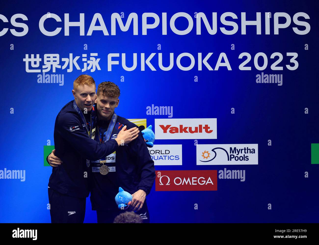 DEAN Tom (L) of Great Britain, silver, and RICHARDS Matthew of United Kingdom, winner celebrate during an award ceremony of men's 200m freestyle in World Aquatics Championships at Marine Messe Fukuoka in Fukuoka on July 25, 2023. RICHARDS Matthew won the event to claim gold medal.( The Yomiuri Shimbun via AP Images ) Banque D'Images