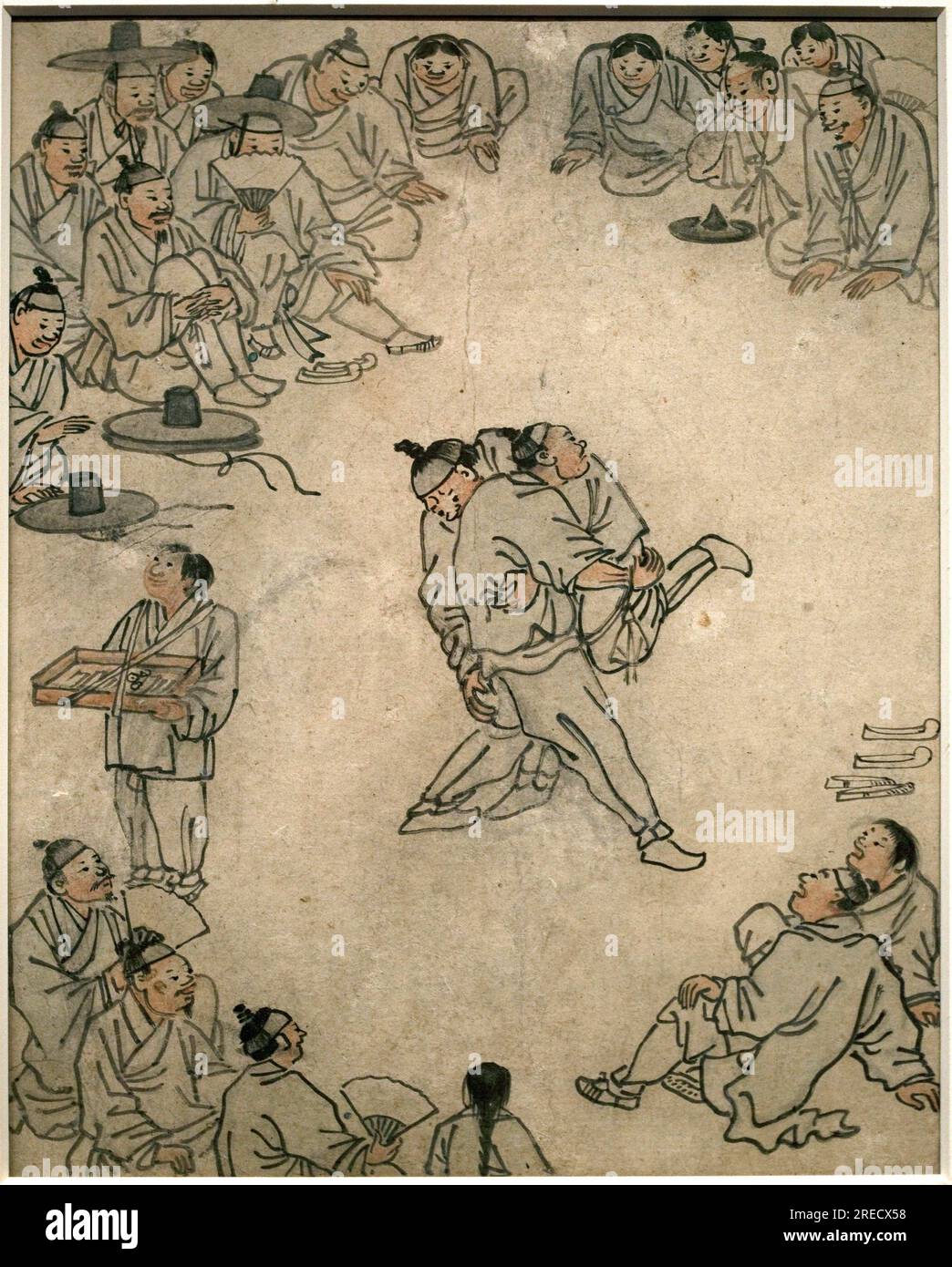 Scene de lutte traditionnelle, avec spectateurs et un vendeur de confiseries. Peinture de Danwon (Kim Hongdo) (1745-1806), encre sur papier, art coreen, periode Joseon (Choson) 18e siecle. Musée National de Coree, Séoul (Coree du Sud). Banque D'Images