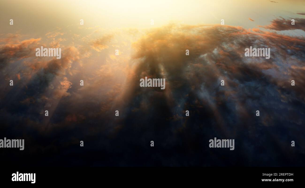 Vol au-dessus des nuages et de l'océan au coucher du soleil. Il peut aussi être comme lever de soleil. Le soleil venant au-dessus de l'horizon. Grand contraste entre la lumière et l'obscurité Banque D'Images