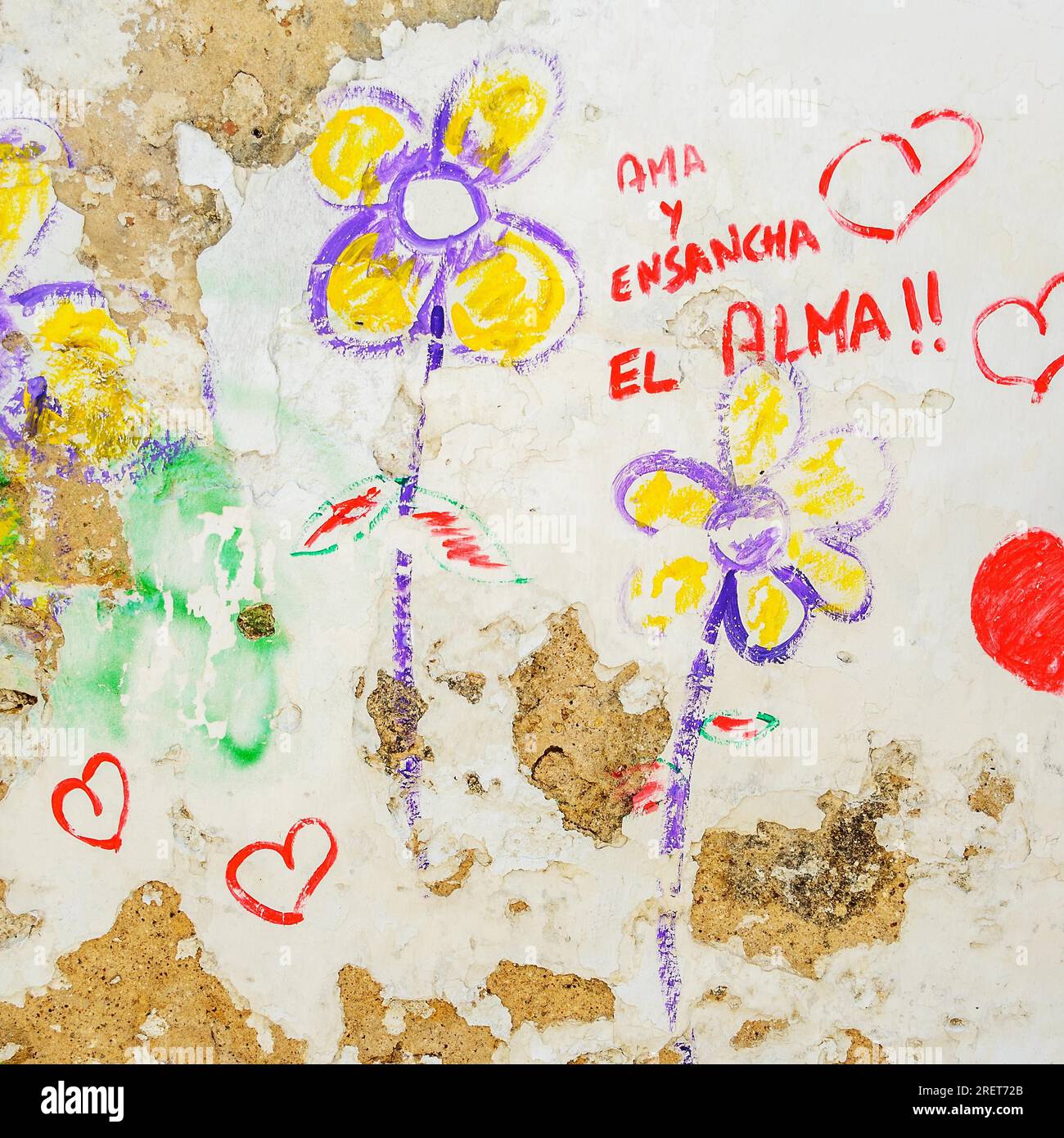 Graffiti avec les coeurs et l'amour balançoires en espagnol Banque D'Images