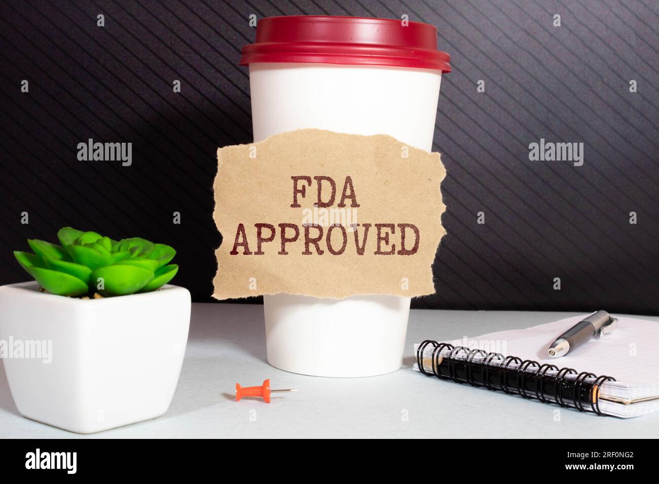 Marquage en caoutchouc indiquant « approuvé par la FDA » Banque D'Images