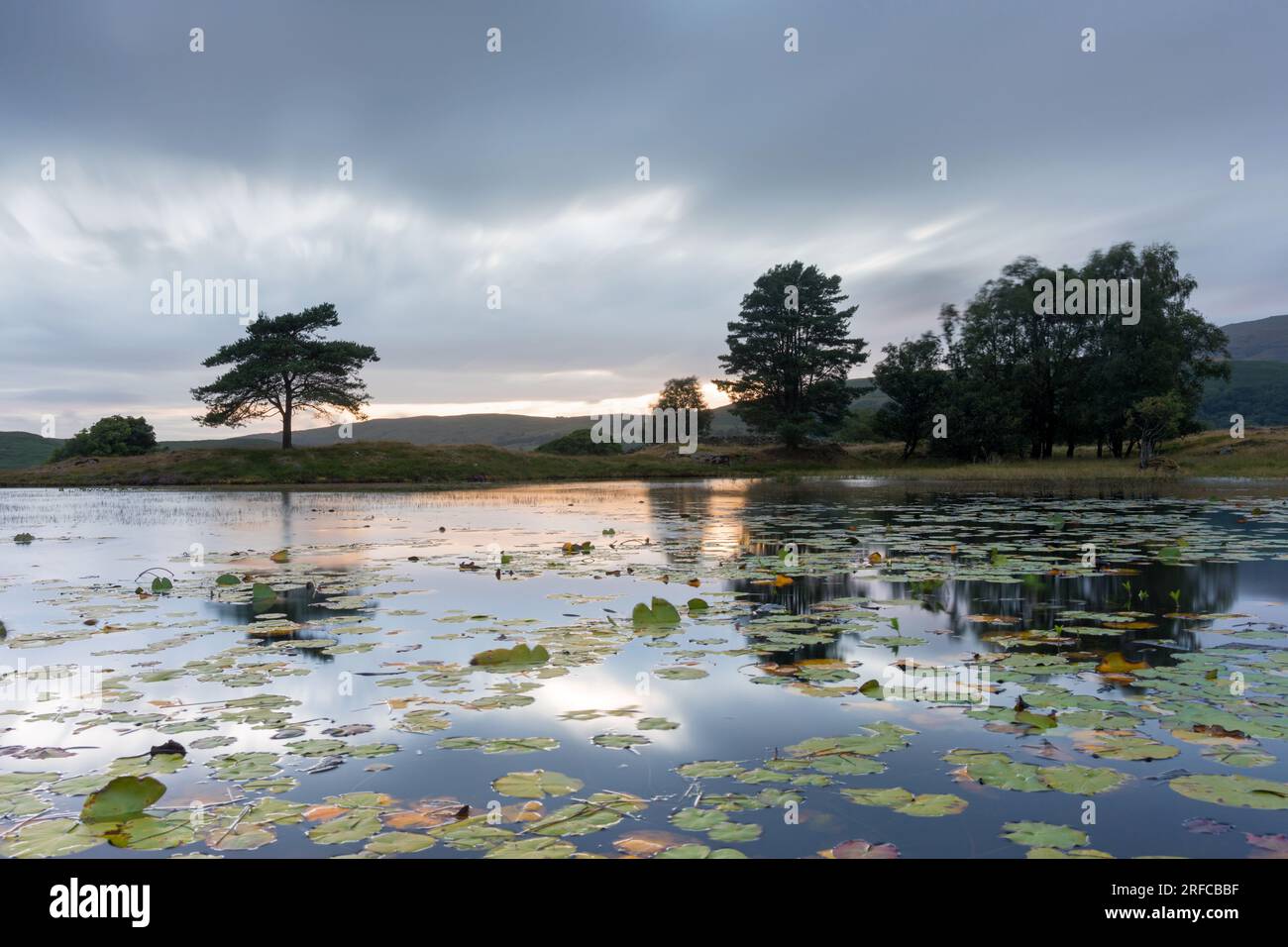Kelly Hall Tarn, Torver, Coniston au coucher du soleil Banque D'Images