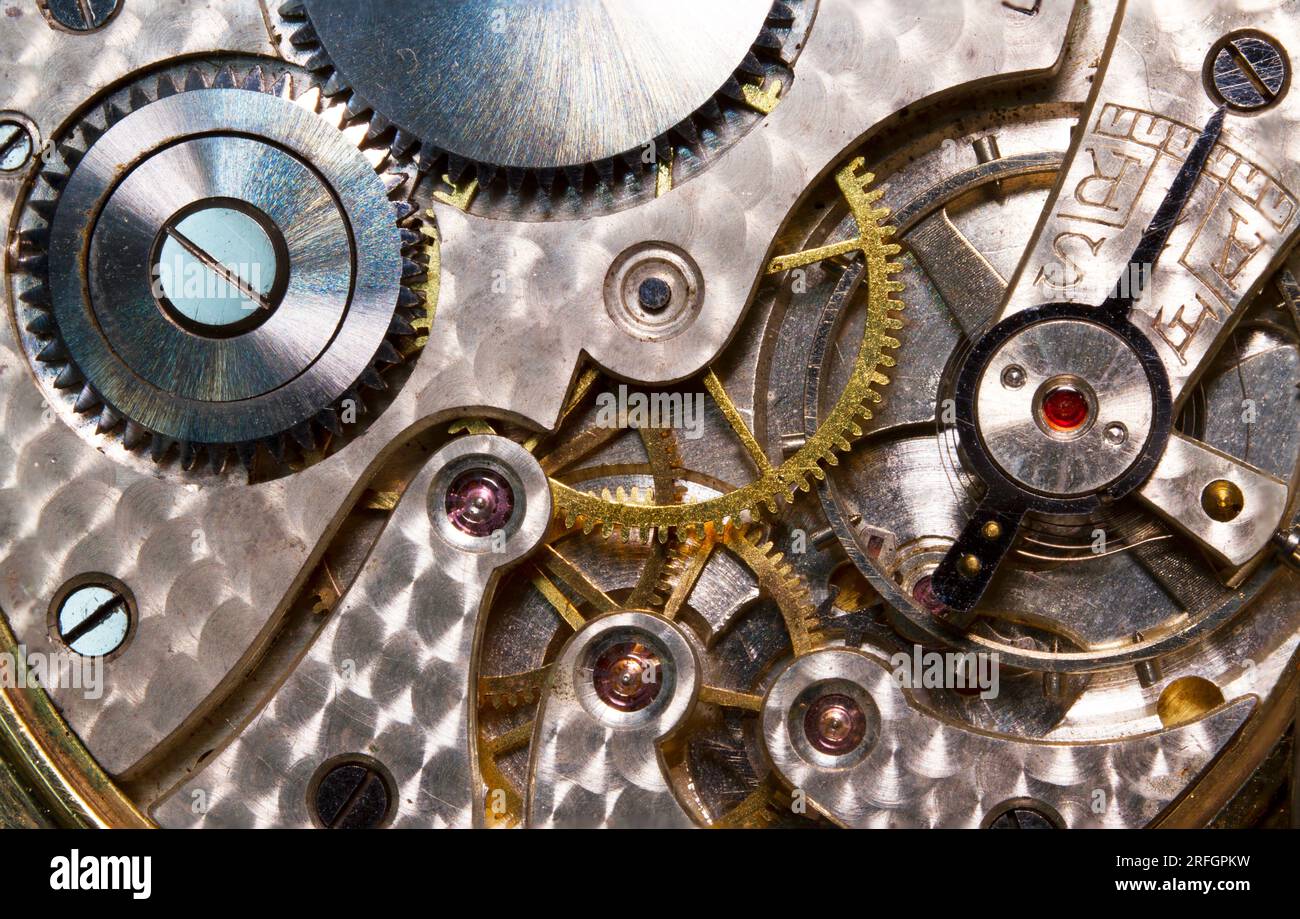 Image macro du fonctionnement interne d'une montre de poche montrant l'engrenage  mécanique et le ressort Photo Stock - Alamy