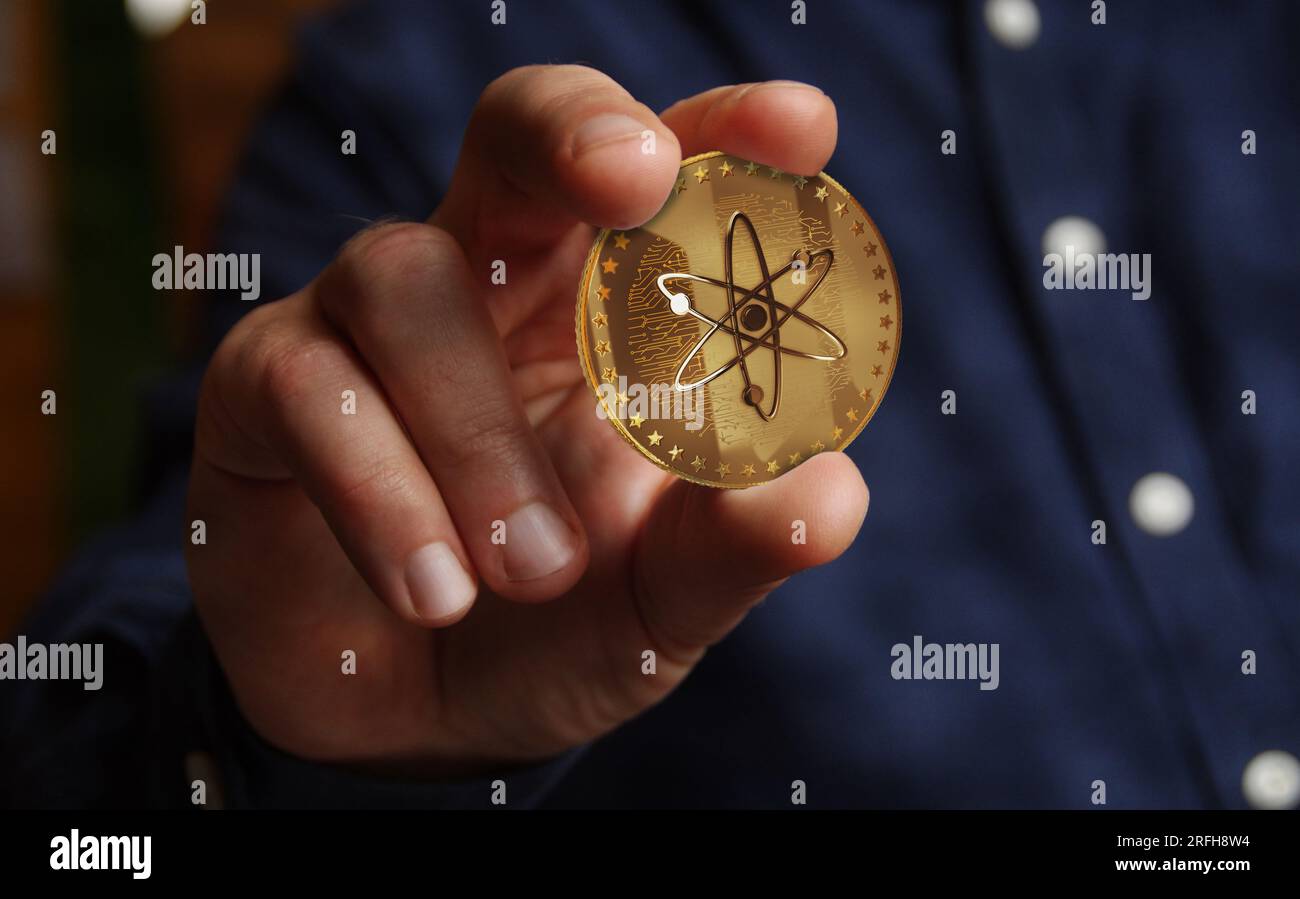 COSMOS ATOM crypto-monnaie Golden coin in Hand concept abstrait Photo Stock  - Alamy
