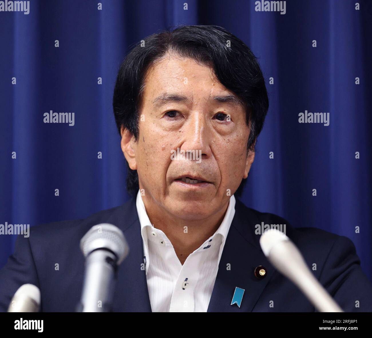 Japan's Justice Minister Ken Saito attends a press conference to announce at the Ministry of