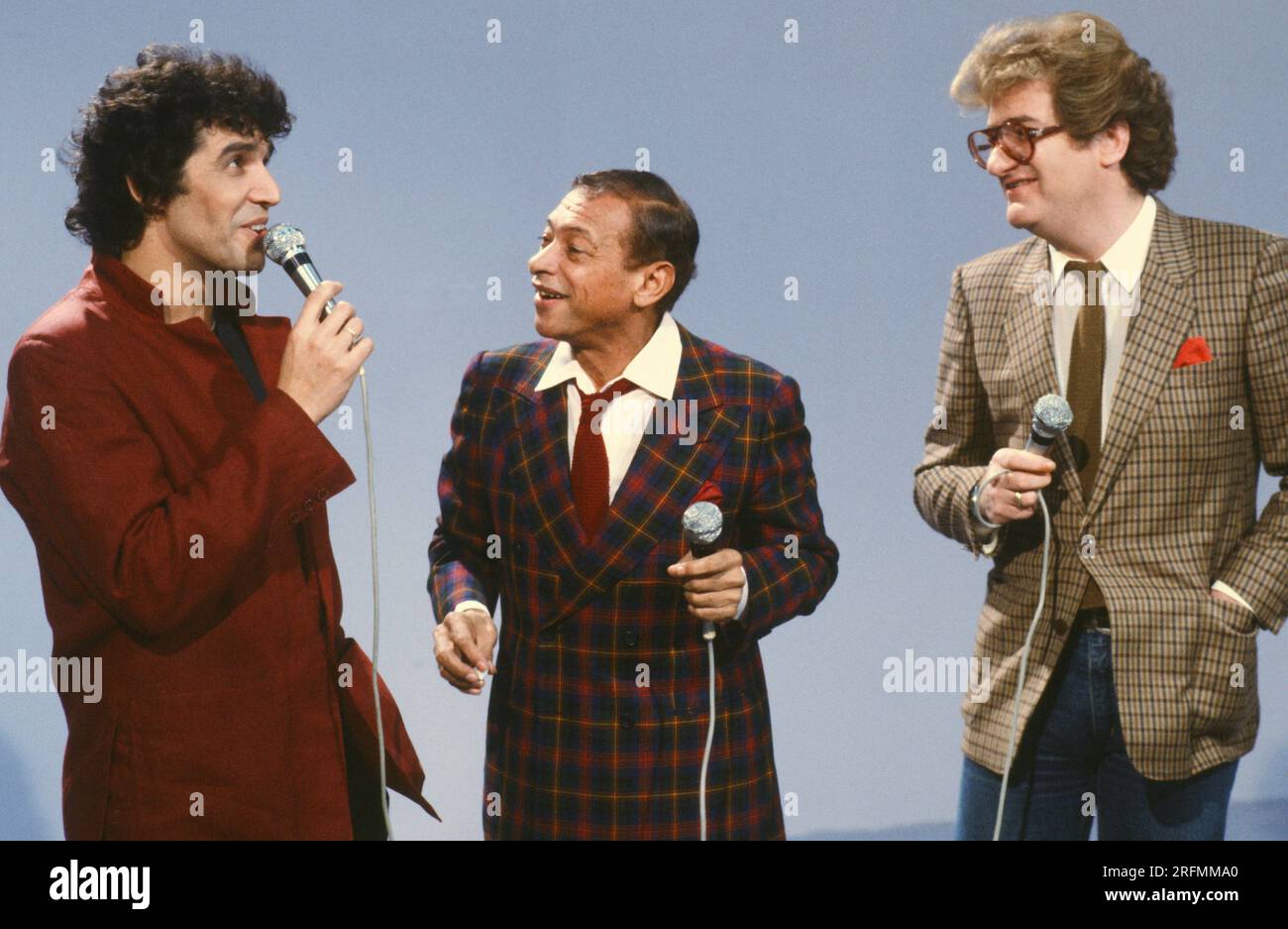 Henri Salvador, Julien Clerc et Eddy Mitchell sur l'ensemble de l'émission télévisée 'Formule un+1' diffusée sur TF1. Janvier 1983 Banque D'Images