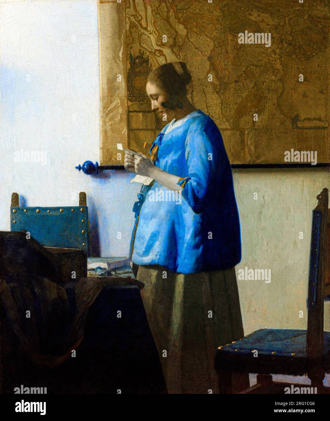 Femme lisant une lettre de Johannes Vermeer. Original du Rijksmuseum. Banque D'Images