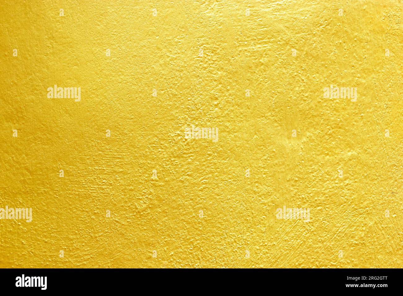 Fond de mur de ciment doré jaune abstrait doré Banque D'Images