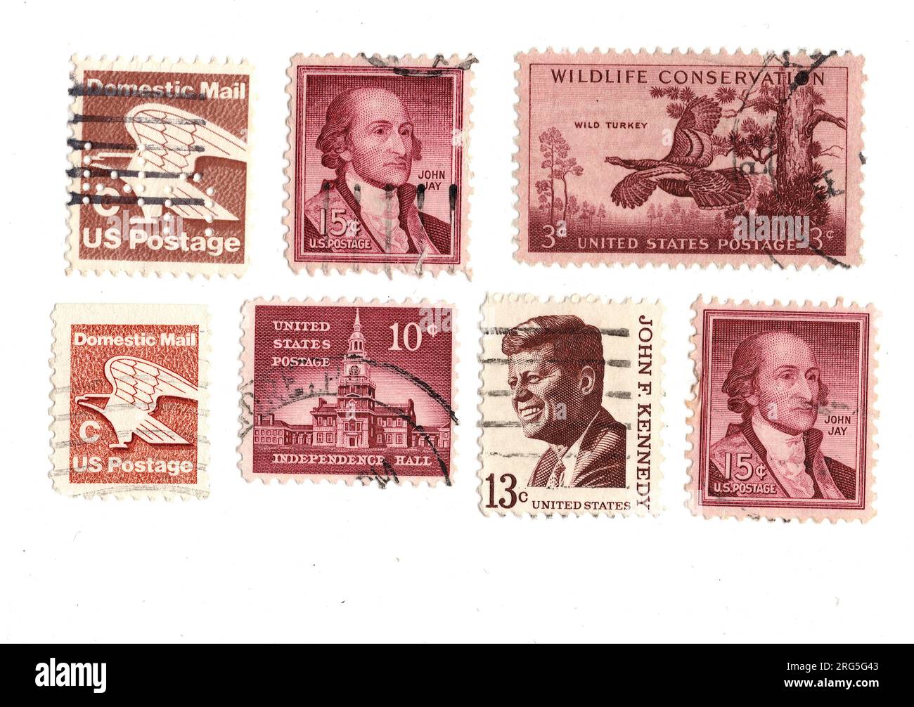 Montage de timbres-poste vintage bruns des Etats-Unis sur fond blanc. Banque D'Images