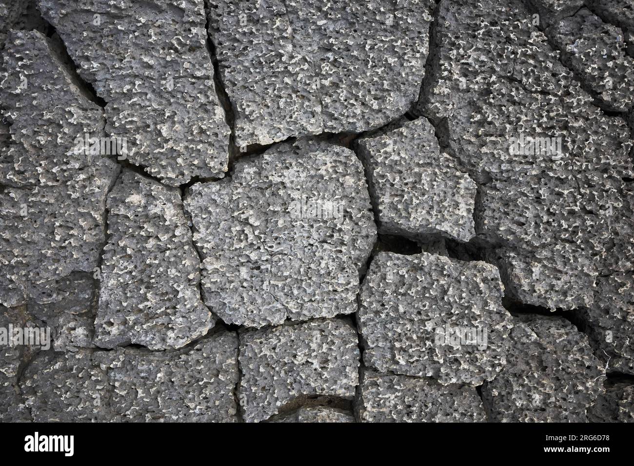 Surface de roche volcanique fissurée, fond abstrait nature, îles Galapagos, Équateur. Banque D'Images