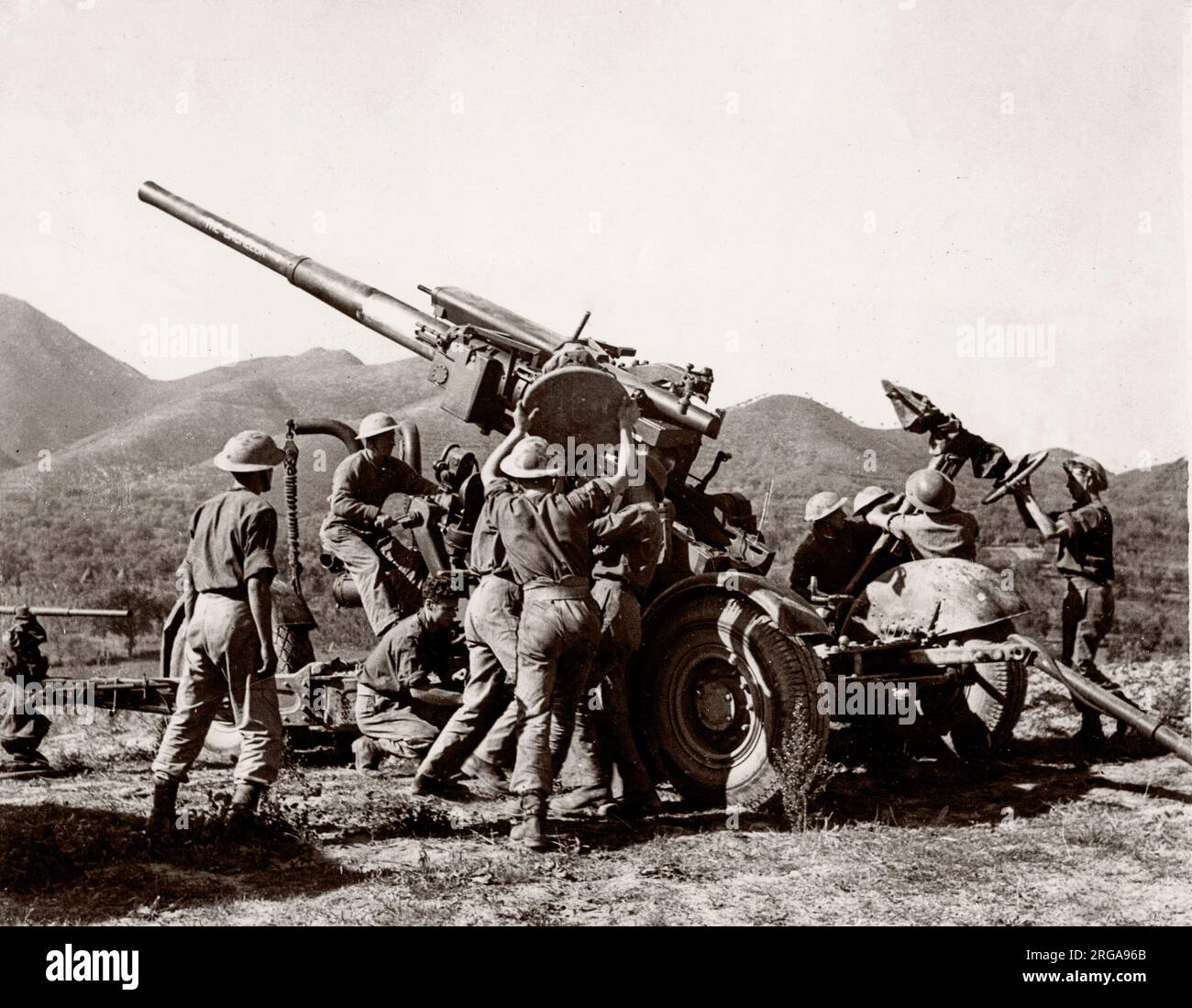 La Seconde Guerre mondiale WW2 - Canon d'artillerie britannique en action Banque D'Images
