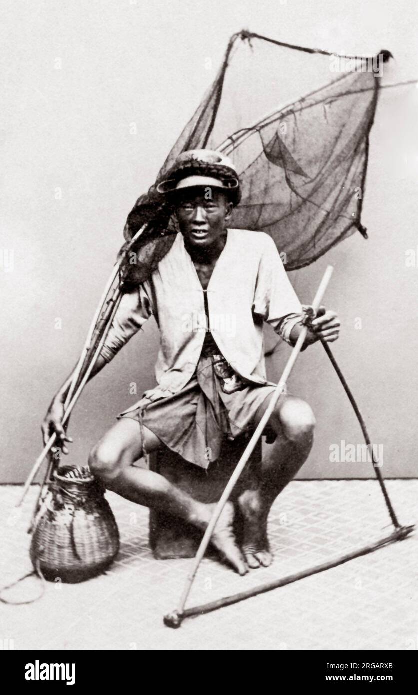 1880 South East Asia - portrait de l'Indochine, le Vietnam ou Singapour - fisherman et filets Banque D'Images