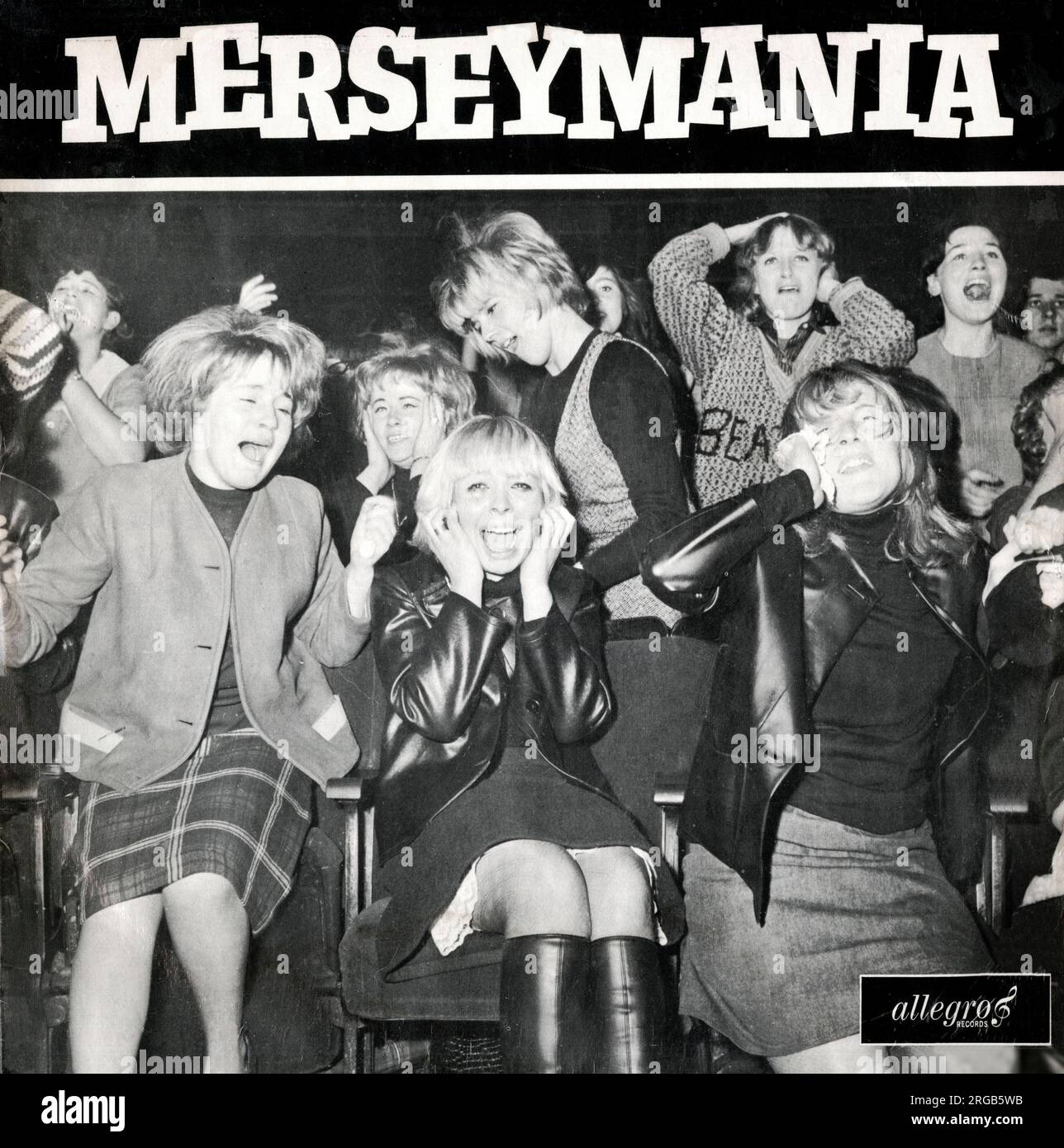 Filles hurlant au concert Beatles - LP Cover, Merseymania Banque D'Images