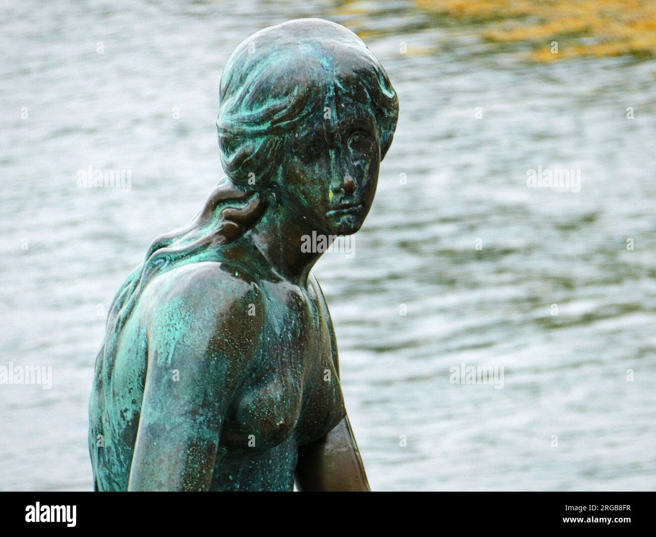 Copenhague, Danemark - gros plan détail de la petite Sirène symbole de la capitale danoise, statue de 1913 à l'entrée du port de Copenhague, in Banque D'Images