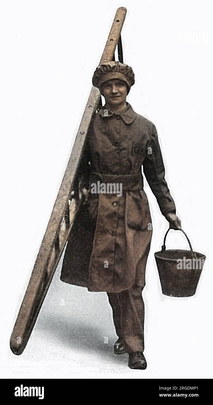 Une laveuse de vitres vêtue d'une veste et d'un pantalon kaki pendant la première Guerre mondiale. Banque D'Images