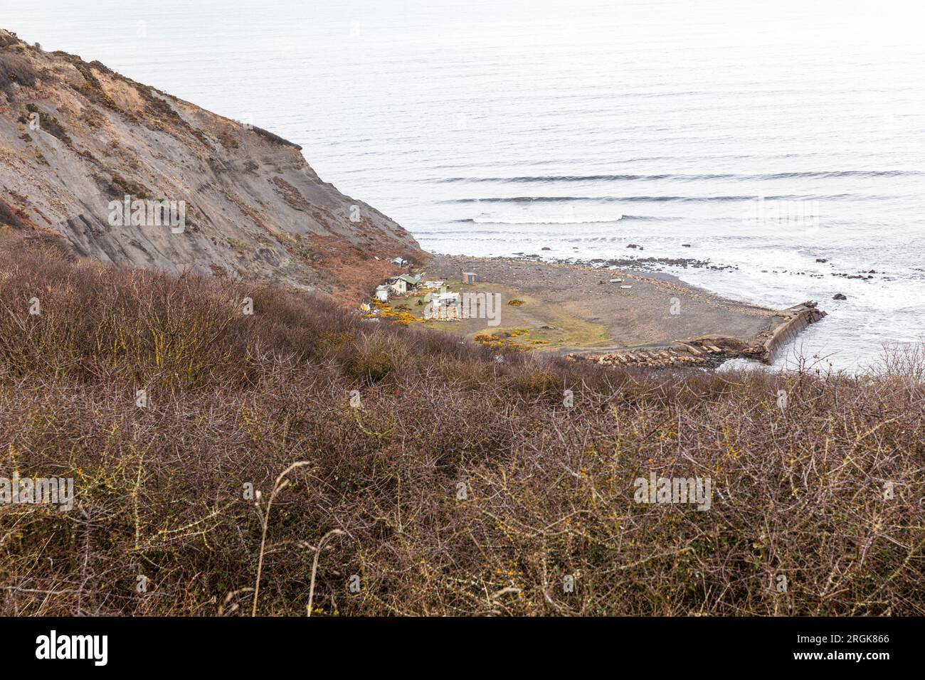 Port Mulgrave, Yorkshire, Royaume-Uni, Angleterre, commune Hippy, cabanes de pêcheurs, fossiles, commune, littoral, côtier, huttes ramshackle, Port Mulgrave Yorkshire, huttes Banque D'Images