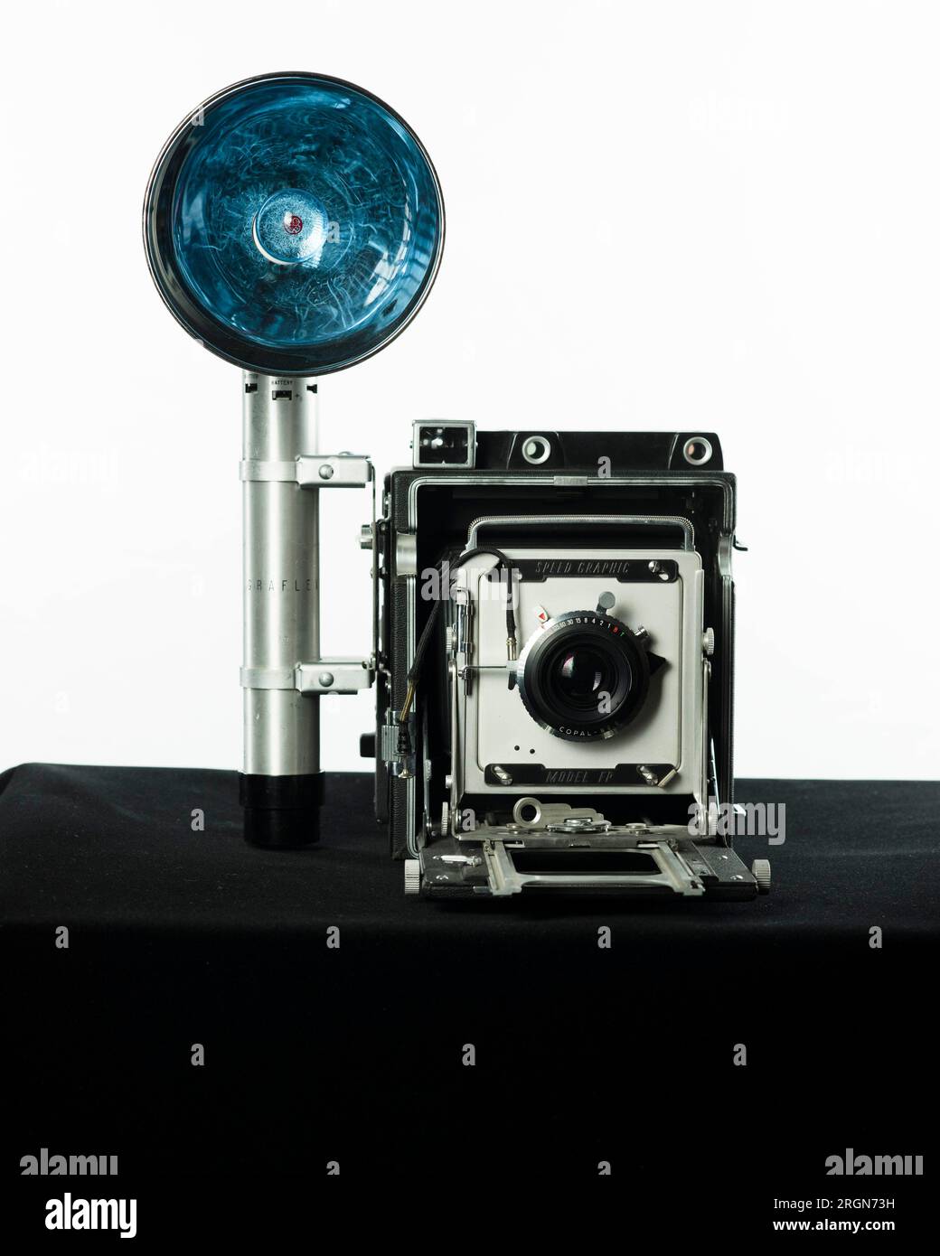 Histoire du FBI : caméra graphique Graflex Speed, produite à l'origine en  1912 par Gralfex et améliorée en 1947. Cet appareil a été fabriqué jusqu'en  1973. Le Graflex Speed Graphic Camera a