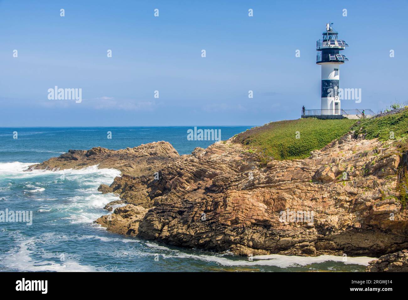 Le phare sur isla Pancha en Galice, côte atlantique de l'Espagne Banque D'Images