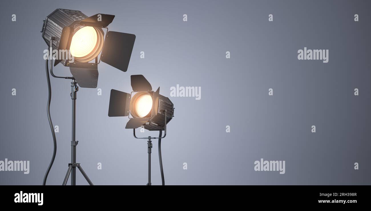 Projecteur équipement d'éclairage de studio pour la photographie ou la vidéographie sur fond gris. illustration 3d. Banque D'Images