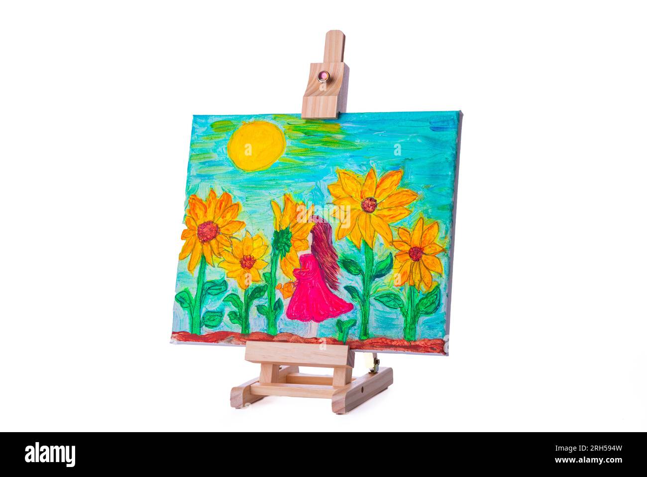 Petite fille en robe dans le champ fleuri de fleurs peinture à l'huile sur toile, image sur un trépied d'art. Banque D'Images