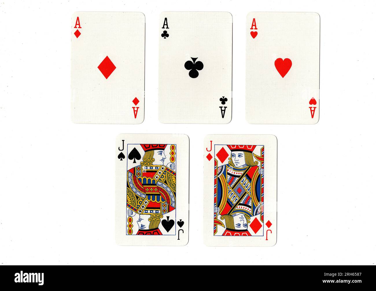 Une main de poker de cartes à jouer montrant une maison pleine d'as sur des valets. Banque D'Images