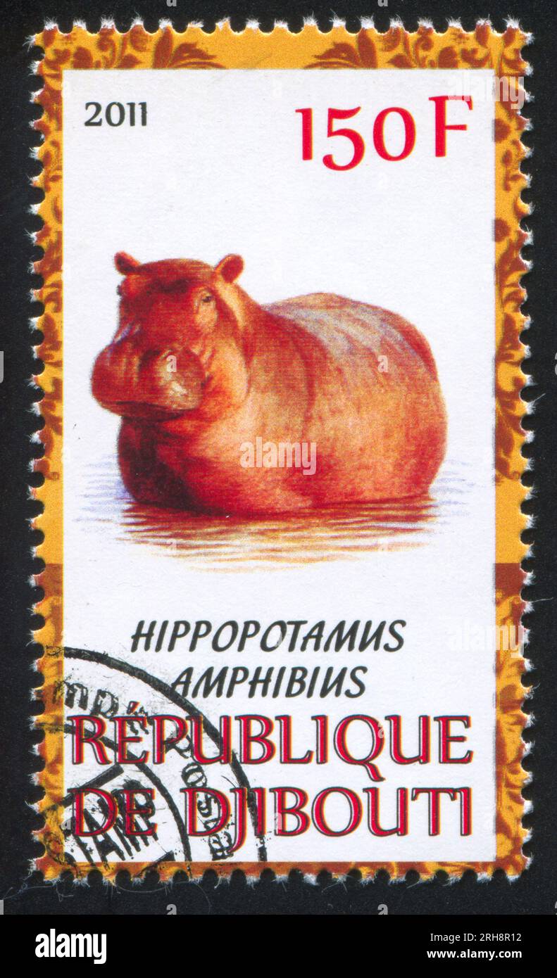 DJIBOUTI - CIRCA 2011 : timbre imprimé par Djibouti, montre hippopotame, circa 2011 Banque D'Images
