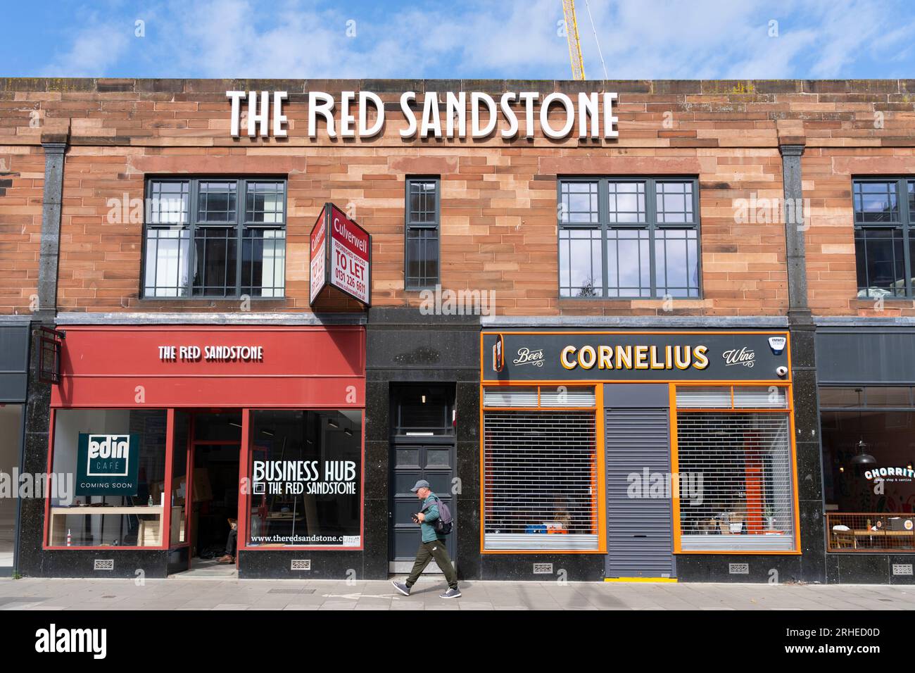 L'extérieur de la propriété Red Sandstone à usage mixte sur Leith Walk, Leith, Édimbourg, Écosse, Royaume-Uni Banque D'Images