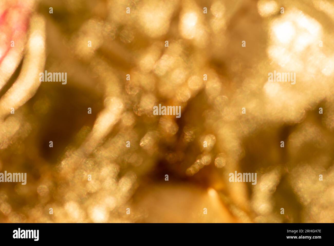 Texture feuille dorée jaune brillante et floue, fond scintillant Banque D'Images