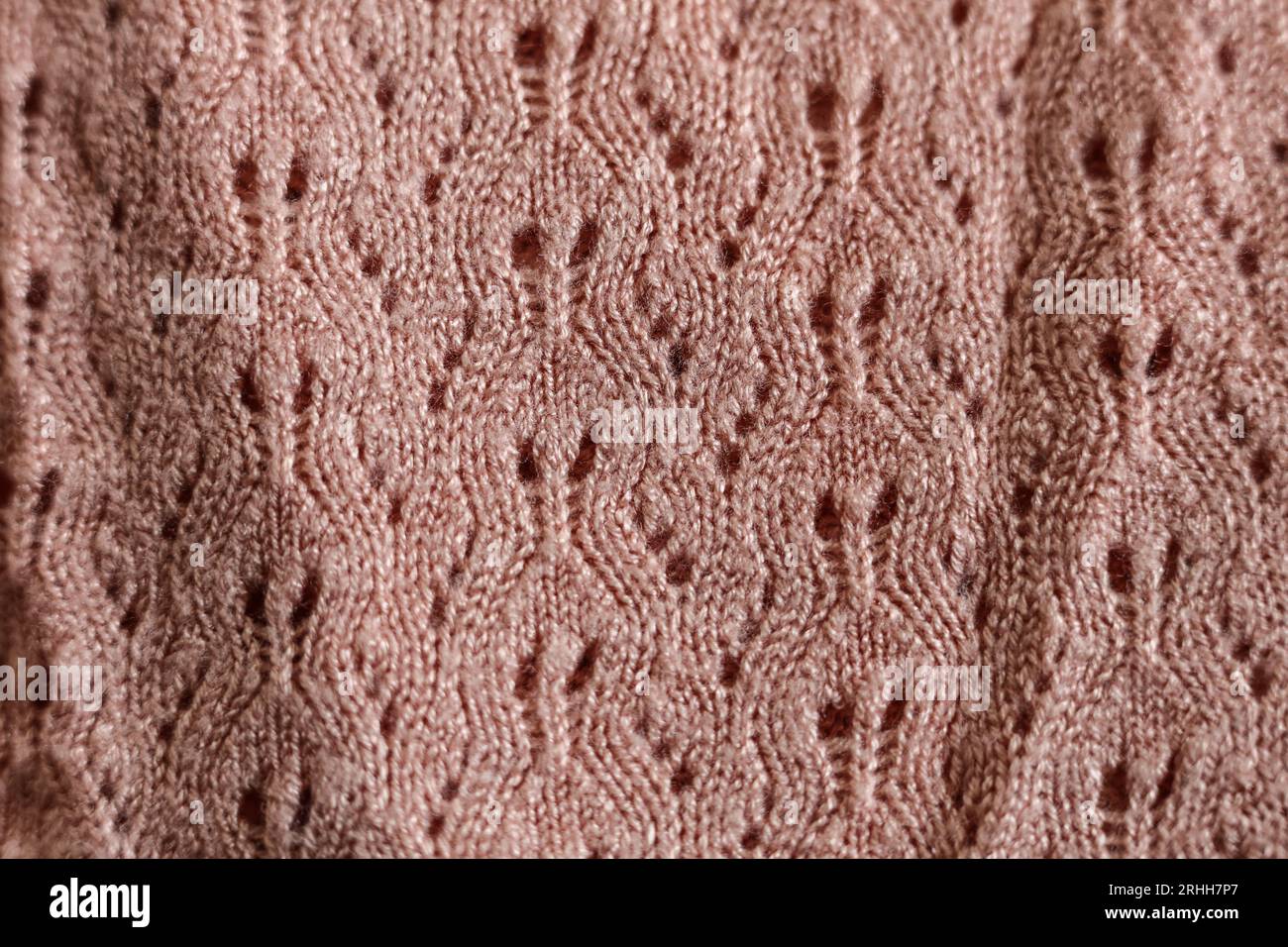 pull en maille rose saumon gros plan Banque D'Images