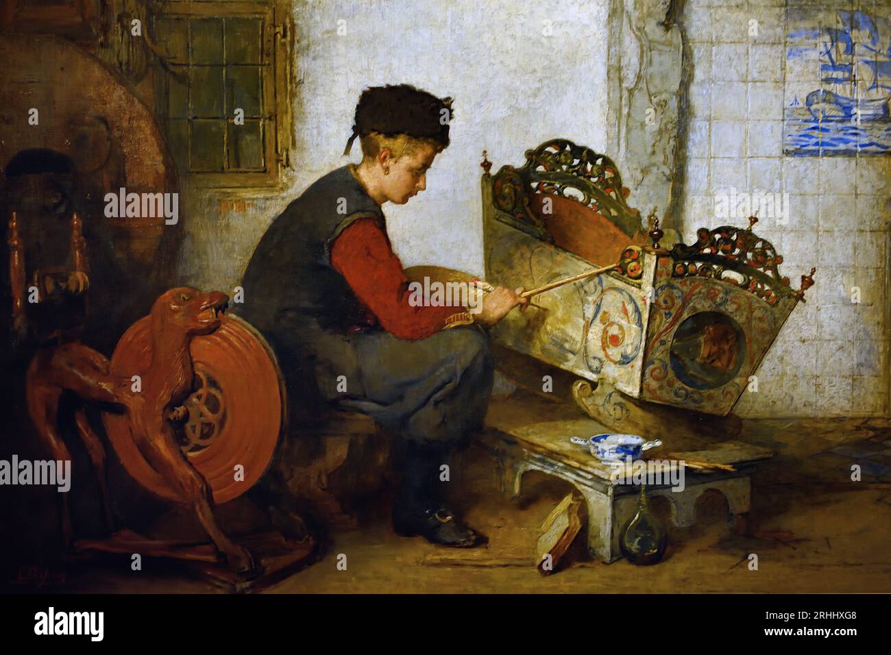 Garçon peignant un berceau 1899-1901 Hindeloopen, Frise. Christoffel Bisschop (1828-1904) artiste frison (épouse anglaise Kate Bisschop-Swift) (1834-1928). Néerlandais, pays-Bas, Banque D'Images