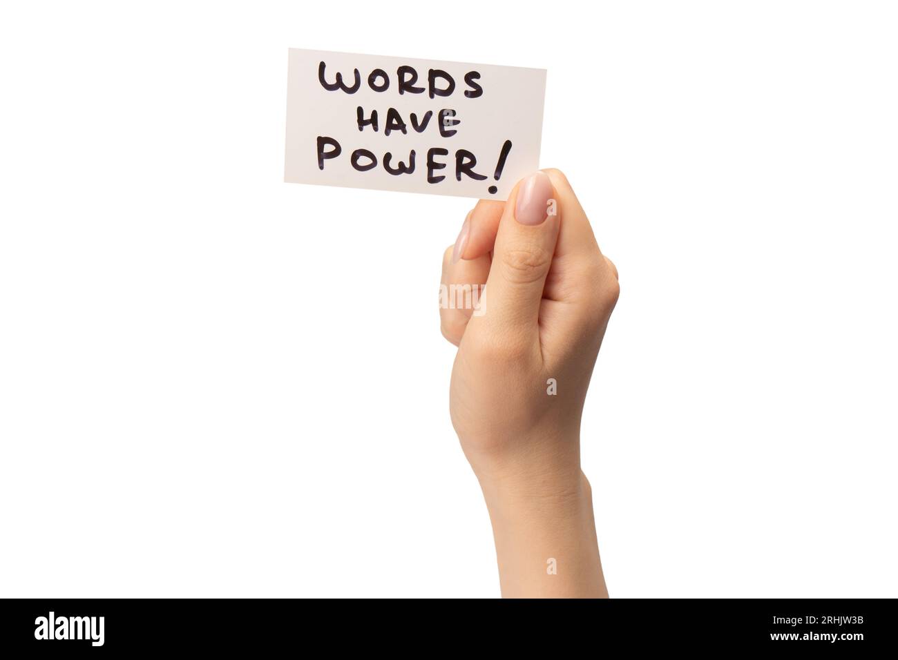 Les mots ont un texte de puissance sur une carte dans une main de femme isolée sur un fond blanc. Banque D'Images
